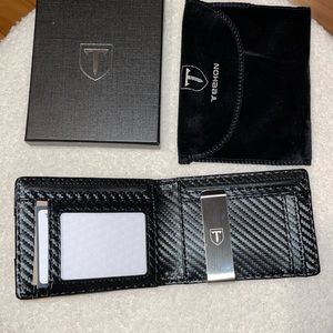 Teehon, coloring is black it has a leather texture and large enough capacity